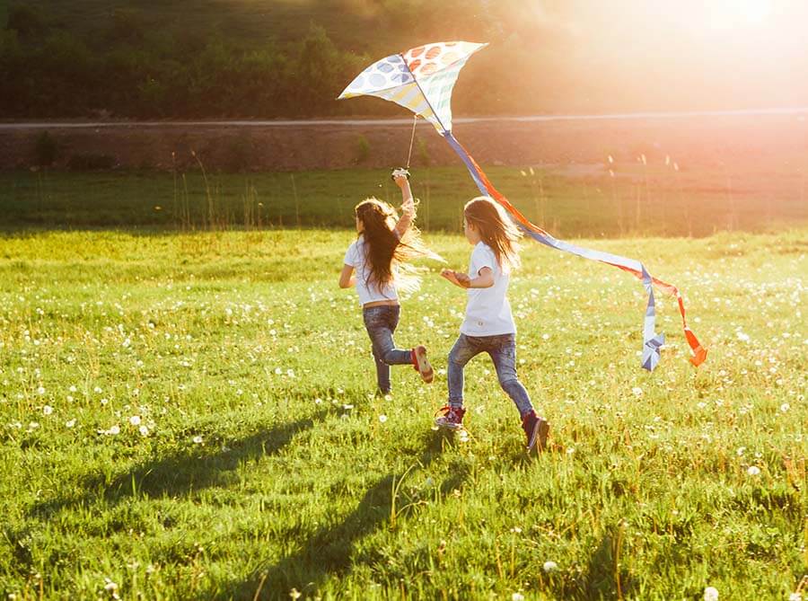 children flying kite to represent child law